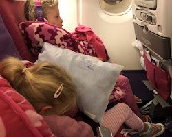Kids on a plane sleeping